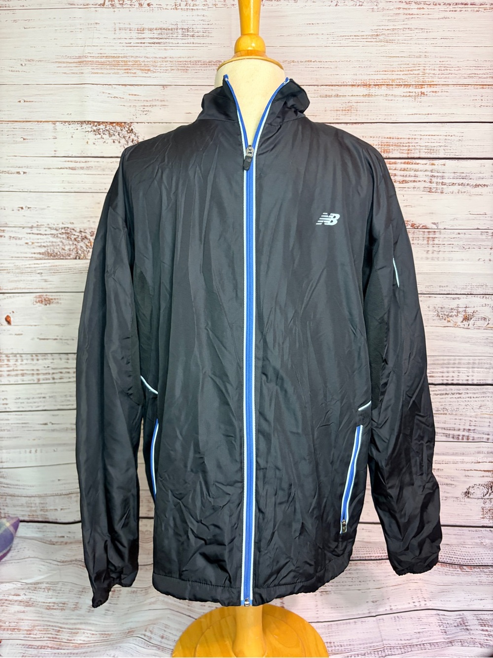 New Balance Black Hooded Performance Jacket with Blue Trim